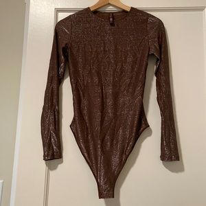 Skims shimmer full sleeve bodysuit, size M, never worn